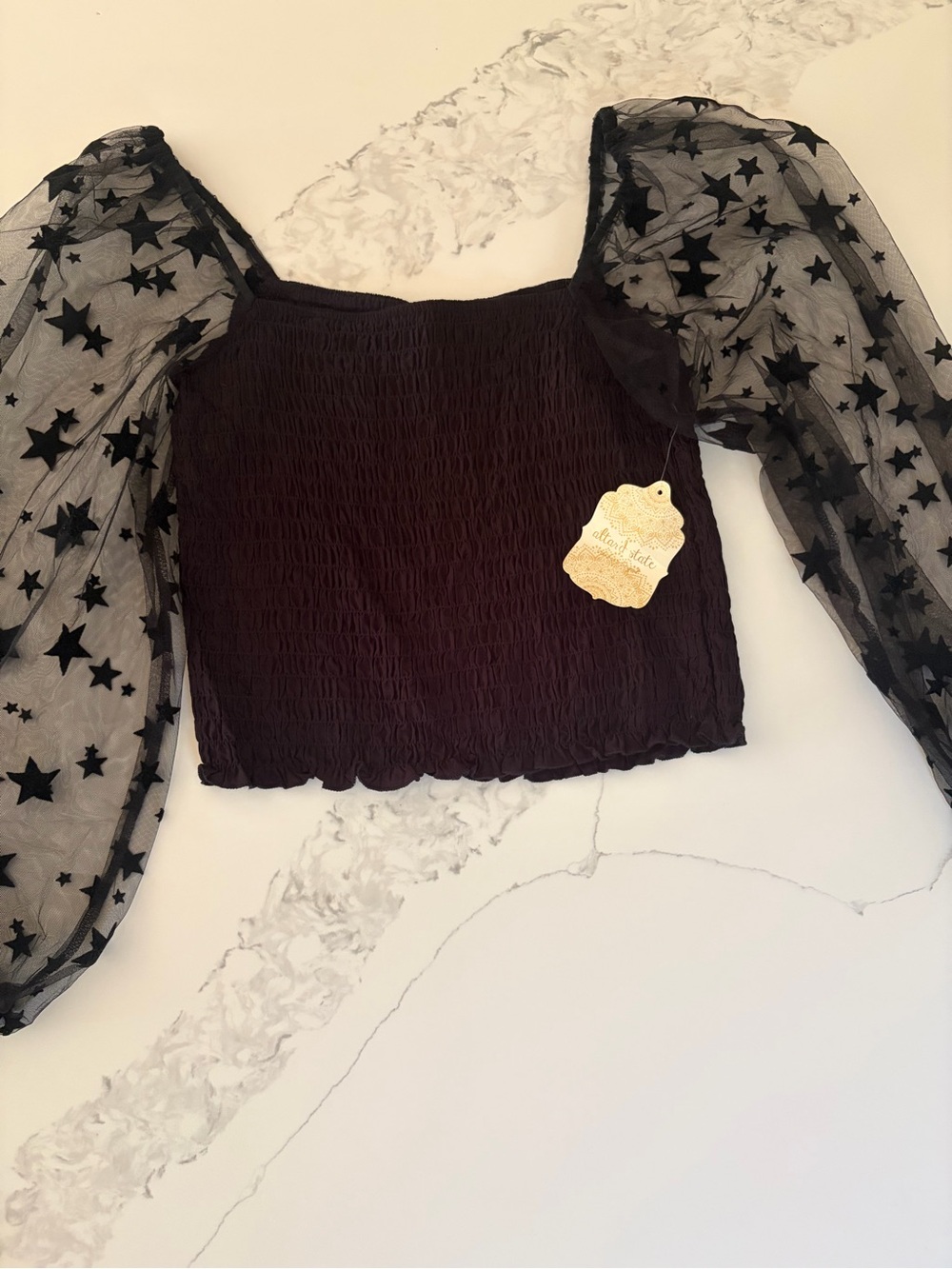 Altar’s State smocked top with sheer puff sleeves